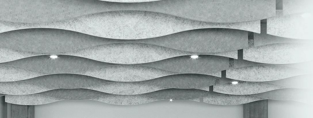 Dos personas colaborando de pie en un escritorio Leva.